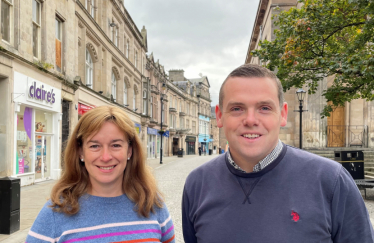 Douglas and kathleen stand in Elgin High Street
